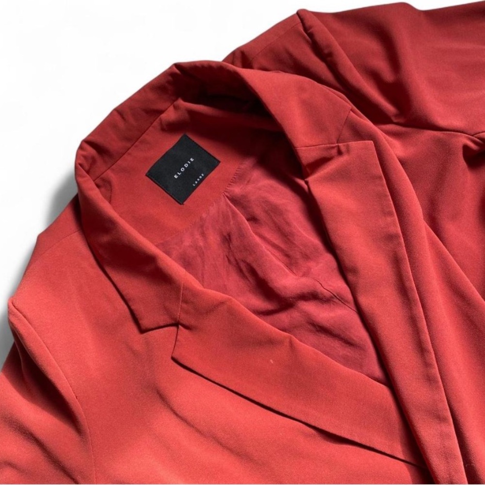 Elodie blazer in a warm rust red color, size Large women’s